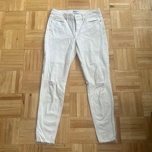 White ankle cropped skinny lo lightly ripped  jeans